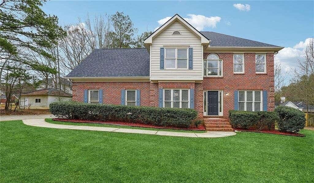 Renovated two-story brick traditional home in Conyers, Georgia